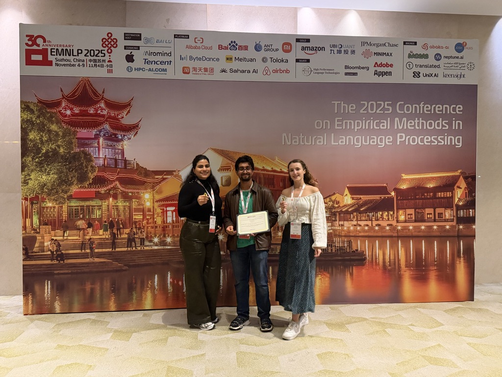 With co-authors at EMNLP 2025